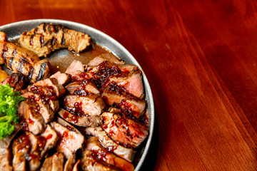 Fresh, juicy assorted sliced grilled meat.