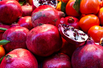  Ripe pomegranate fruit on a market stall in Bologna, Italy