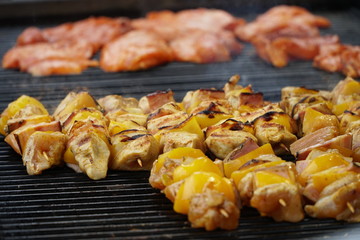 Barbecue with delicious grilled meat on grill on christmas market