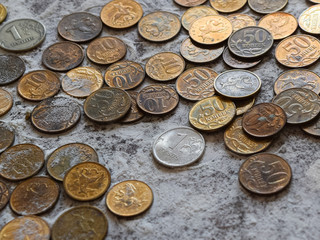 Coins in the flour in the balance. Rubles and kopecks.