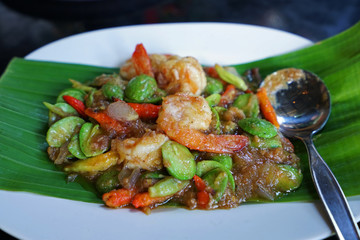 Close up stir fry prawn with Pakria(Bitter beans) and shrimp paste