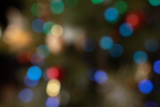 Multicolour defocused bokeh lights in the night for background New Year festive