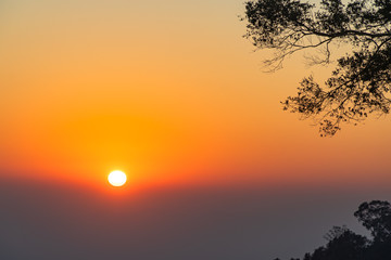 golden sunrise above the mountain range on Khun Sathan Nation Park
