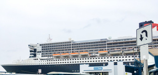 Legendary and luxurious Cunard luxury ocean liner Queen Mary 2 cruise ship QM2 in port of Brooklyn,...