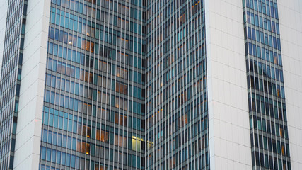 Textures from the facades of night buildings. geometric texture. modern architecture, illumination. composition of curved shapes