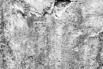 Texture of a concrete wall with cracks and scratches which can be used as a background