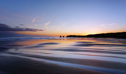 Fototapeta na wymiar Sunrise reflection on Hendaye beach 