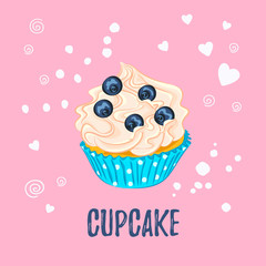 Cupcake with cream and blueberry on pink