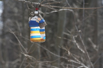 A Decorated Bird Feeder in a Park in Spring