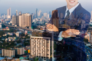Businessman standing and cross arm..