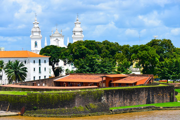 View of our Lady of Grace Cathedral and Presepio Forte in city Belem. Old historical buildings