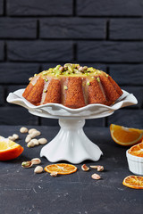 pumpkin carrot bundt cake on a stand