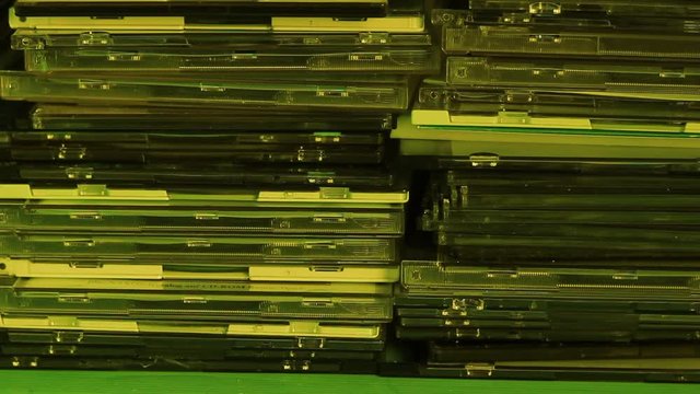 Wraps of DVD, CD boxes background.