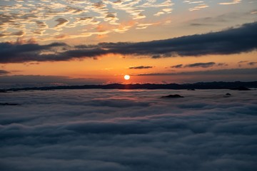 Sea of ​​clouds and sunrise