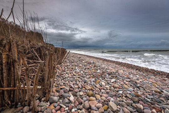 A pebbly beach on the Baltic Sea on a rainy day. Wicie, Poland
