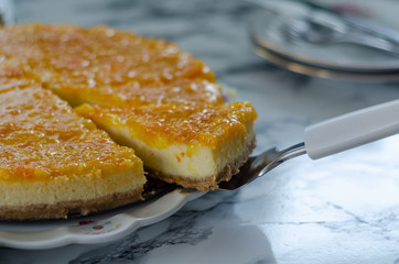The cheesecake with orange.