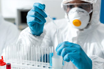 selective focus of african american scientist doing dna test