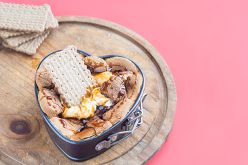 Marshmallow with chocolate for dips in red background