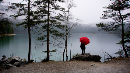 Walk around the Eibsea (Eibsee) near Zugspitze (highest mountain in Germany). Sea surrounded with...