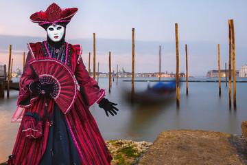 Colorful carnival masks at a traditional festival in Venice, Italy
