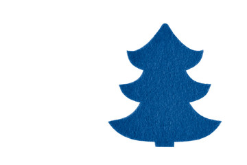 Isolated felt toy in the form of a Christmas tree on white background. Fir in trendy color of year 2020 classic blue