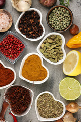 Spices and herbs on table. Food and cuisine ingredients and lemon