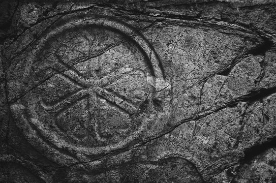 Texture of stone with cracks.  beautiful texture free space. Vintage style, ancient symbol