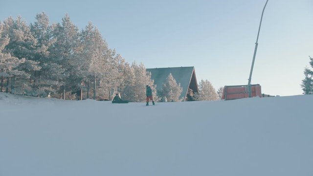 Snowboarding - A Disabled Man With Prosthetic Leg Skating On The Mountain