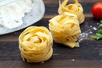 uncooked fettuccine pasta on the table