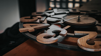 old wooden clock on the table