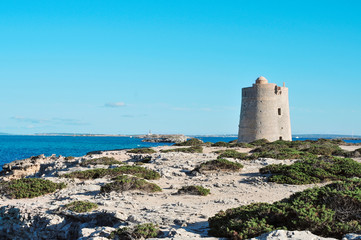Fototapeta na wymiar Torre de Ses Portes tower in Ibiza Island, Spain.