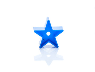 Blue star toy on white background