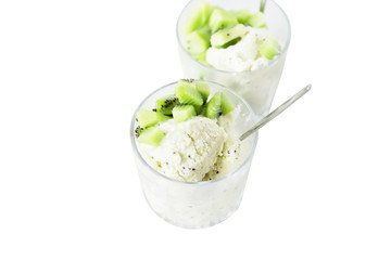 Green ice cream with kiwi isolated on white background. Dairy free frozen dessert - nice cream. Sweet sorbet with fruits