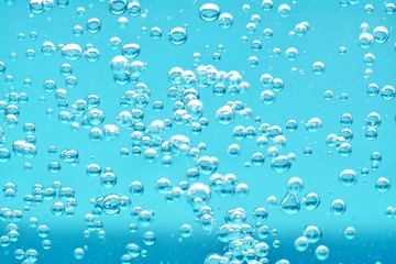 Fototapeta na wymiar air bubbles in water macro background