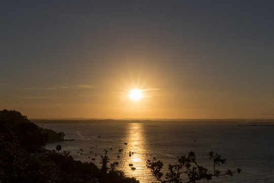 View of wonderful sunset in Morro de Sao Paulo, Bahia, Brazil. Hill. © Gabriel Ramos