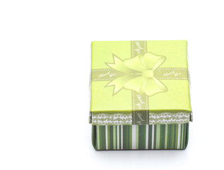 A green gift box with white strip