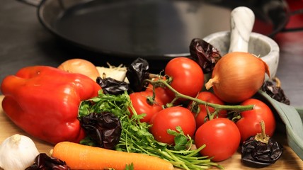 Vegetables and Fish used to cook Paella in the typical Spanish Way. This Spanish speciality can be made with seafood or meat