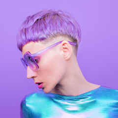 Futuristic Fashion Lady with violet short hair. Trendy hair style