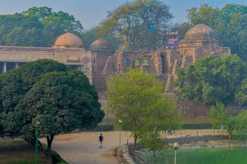 A mesmerizing view of hauz khas lake and garden from the hauz khas fort at hauz khas village at...