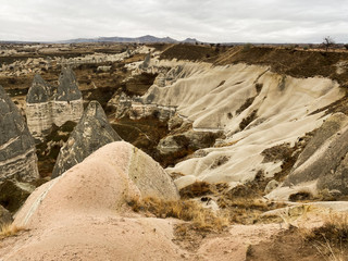 Ancient rock formations with caves. A famous place for flying in balloons. Cappadocia. Turkey November 5, 2019.