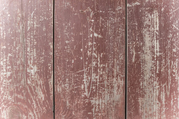 Peeling brown boards.