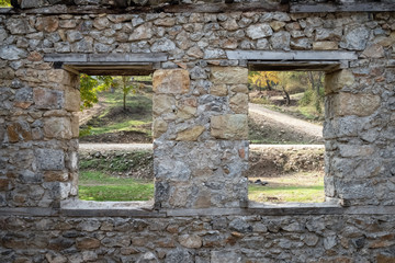 Fototapeta na wymiar village house and window made of stone