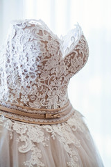 Fototapeta na wymiar bridesmaid dress lace. dress on manikin