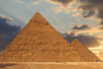 Fototapeta na wymiar Famous great Giza Pyramids in sand desert in Cairo. 