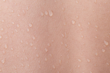 drops of water on human skin  - 312062609