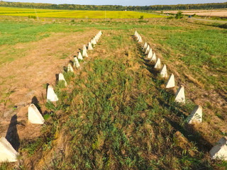 Obraz premium The ruins of the old farm. Cones column base of the wall. Abando