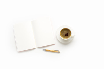  Flatlay with blank notepad, pen and coffee cup on white background