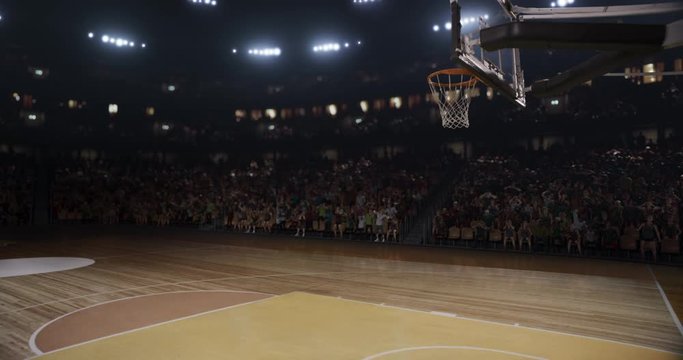 4k video of an empty professional basketball stadium with a crowd made in 3d and animated.