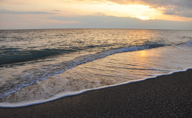 Beautiful sunset on sea during a storm