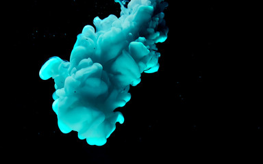 Watercolor ink in water. Cool trending screensaver. Space mint blue abstract background.